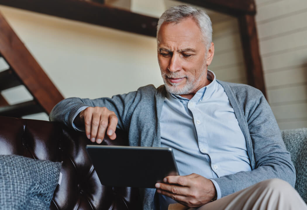 man using a tablet